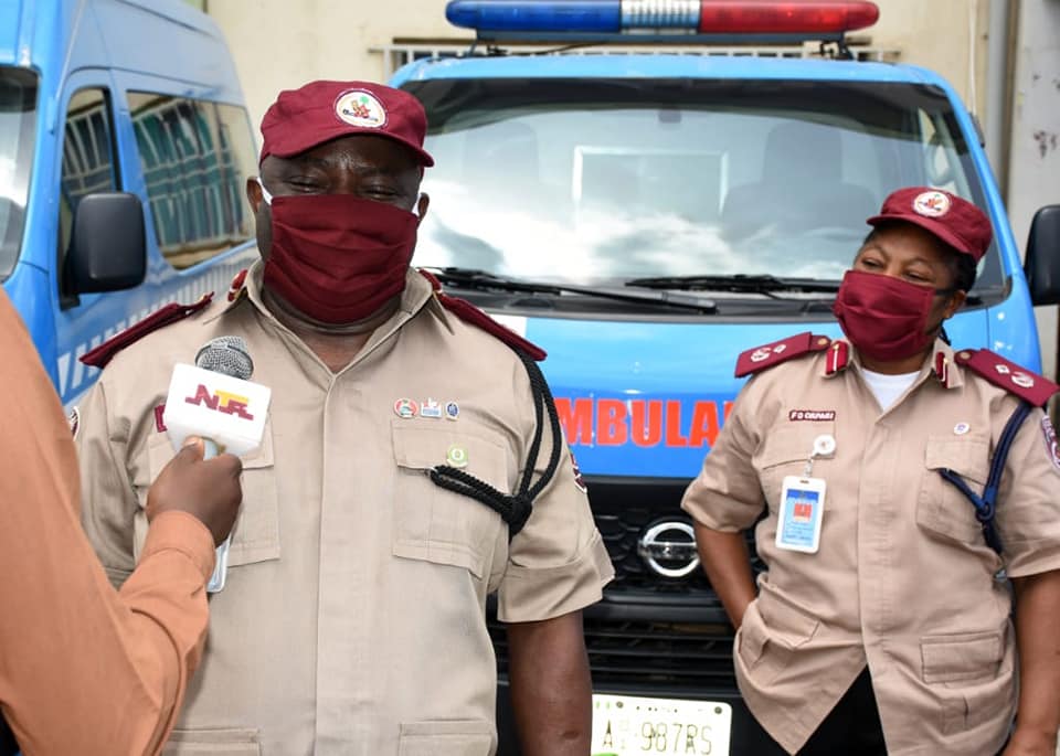 Federal Road Safety Corps official and the ambulances.