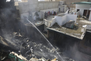 Pakistan plane crashes in residential area.