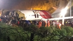 18 dead, scores injured as plane crash lands in India