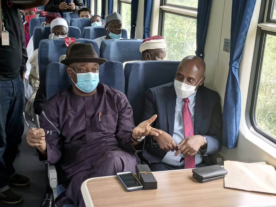 The Minister of Transportation, Chibuike Amaechi and the Minister of State of Labour, Festus Keyamo on a train in the rail line.