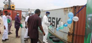 The Managing Director of National Inland Waterways Authority, Chief Dr. George N. Moghalu receiving container in Onitsha port.
