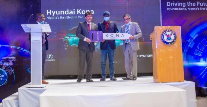 L-R: Hyundai brand head Mr. Gaurav Vasisht, Lagos state Governor, Mr. Babajide Sanwo-Olu and Managing Director of Stallion VON  Mr. Manish Rohtagi during the launch of the first assembled electric car in Nigeria-Hyundai Kona in Stallion VON assembly plant in Ojo, Lagos