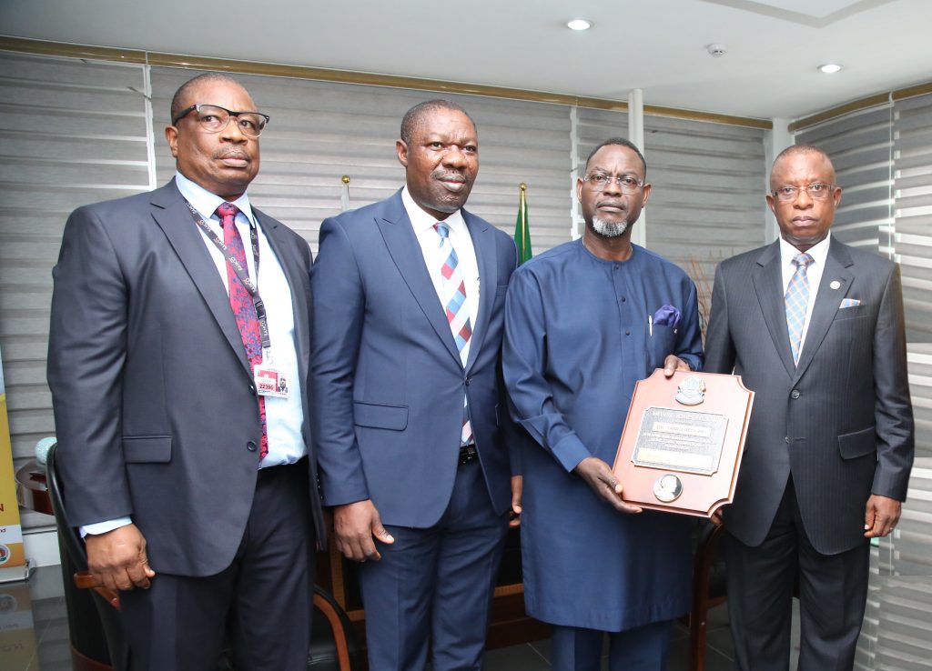  L-R: Olaniyi Adigun, Executive Director, Sales & Marketing, SAHCO Plc; Basil Agboarumi, Managing Director, SAHCO Plc; Dr. Taiwo Afolabi, Chairman, SIFAX Group; Lion Anogwi Anyanwu, District Governor, 2022-2023, District 404 A1 during the presentation of the Melvin Jones Fellow Award to Dr. Taiwo Afolabi, Chairman, SIFAX Group for his dedicated humanitarian services. The award ceremony was held at SAHCO Plc Head Office, Cargo Village, Murtala Muhammed International Airport, Lagos.