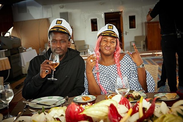 Mr Eazi and DJ Cuppy onboard the Luxury Christina O yacht 